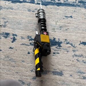 Black and Yellow Electronic Device